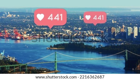 Composite of heart shapes and 441 number in speech bubbles over aerial view of cityscape. Counting, likes, social media, notifications, communication, skyscrapers and technology concept. Royalty-Free Stock Photo #2216362687