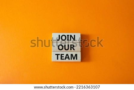Join our team symbol. Wooden blocks with words Join our team. Beautiful orange background. Business and Join our team concept. Copy space.