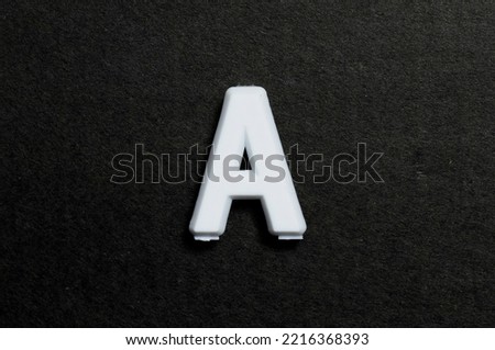 Letter A on a black background Royalty-Free Stock Photo #2216368393