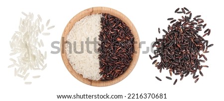 white and black rice grains in wooden bowl isolated on white background. Top view. Flat lay Royalty-Free Stock Photo #2216370681