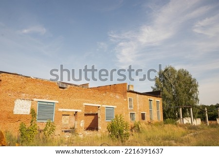 Red brick technical building on the territory of an abandoned enterprise