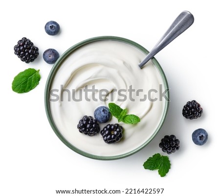 Green bowl of greek yogurt and fresh berries isolated on white background, top view Royalty-Free Stock Photo #2216422597