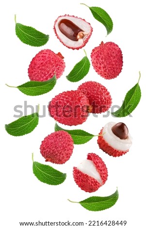 flying fresh lychee with slices and green leaves isolated on white background. clipping path Royalty-Free Stock Photo #2216428449