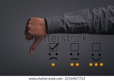 hand showing a sign of a low mark. Thumb down with graphic one star, bad service, dislike, bad quality, Bad review. Customer Experience dissatisfied Unhappy Businessman Client with Sadness Emotion.