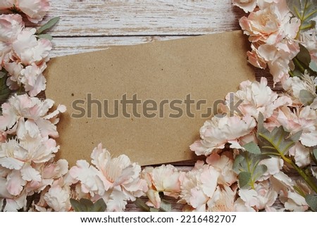 Space for copy background and flower decoration on wooden background