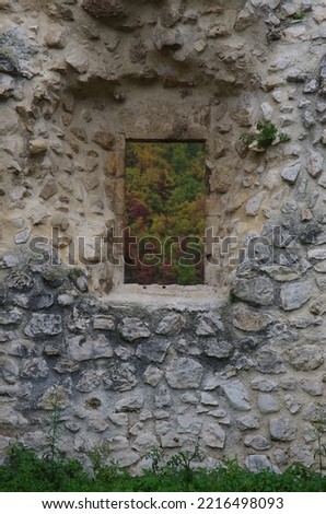 Pacentro - Abruzzo - Italy - A small window lets you glimpse the autumn colors.
