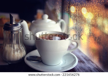 tea in the cafe showcase city Royalty-Free Stock Photo #221656276