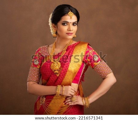 Beautiful Indian bride in studio shot. Royalty-Free Stock Photo #2216571341