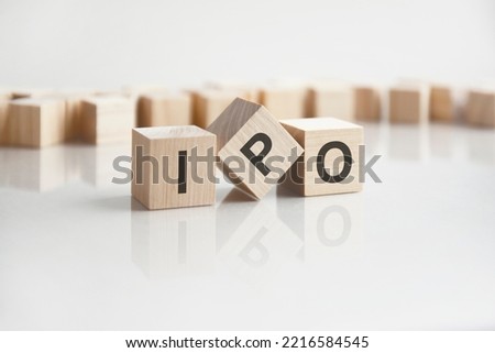 text IPO on wooden blocks with letters on a white background