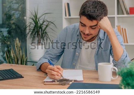 student at home studying with laptop