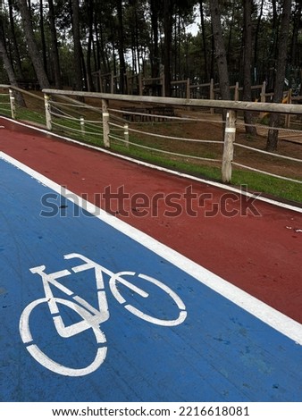 picture of a bicycle drawn on a bicycle path