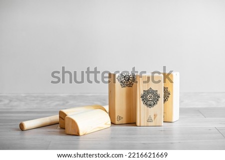 wooden yoga blocks on the floor in the gym. Yoga bricks are an aid in the practice of yoga for taking the right asana. accessories and tools for sports. 
