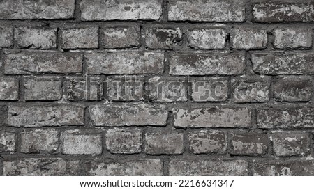 gray background, gray brick wall in the photo.