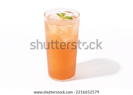 A picture of strawberry lemon iced tea. a white background