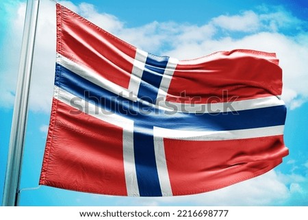 Waving flag on a pole of country Norway