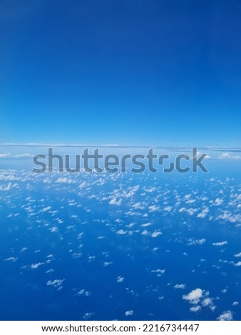 sky view from the air craft Royalty-Free Stock Photo #2216734447