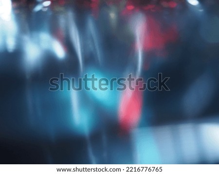 Blurred red and blue light at night for abstract background.