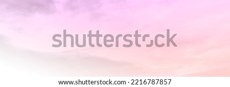Pink sky with white cloud. The firmament before a large storm. Sweet dream background.