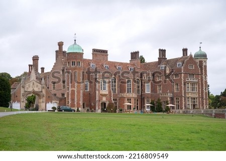 Cambridge, Cambridgeshire, England, October, 2022: Front aspect view of Madingley Hall, Cambridge. Royalty-Free Stock Photo #2216809549