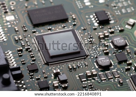 Circuit board with micro-chips and other electronics components Royalty-Free Stock Photo #2216840891
