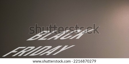 Black friday with dark background, with large letters, shadows, black, gray, sale promotion