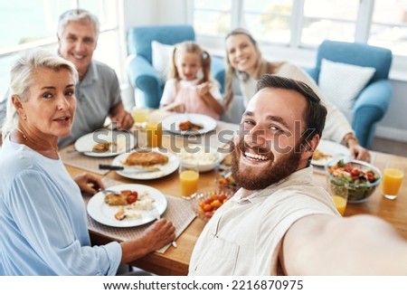 Love, selfie and food with big family in home for cheerful photograph together in Australia. Parents, grandparents and child at lunch dining table with happy smile for picture memory in house.