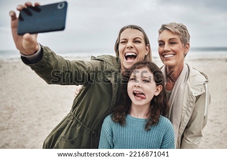 Beach, grandma and child selfie with phone for happy family holiday break together in Canada. Mother, daughter and grandmother capture joyful picture for social media on ocean leisure walk.