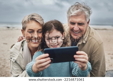 Phone selfie, beach and grandparents with child bond on relax adventure, fun travel journey or Sydney Australia vacation. Memory picture, love and happy family of grandpa, kid girl and grandma smile
