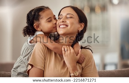 Happy, kiss and hug on mothers day in living room sofa, love and relaxing together in Australia family home. Young girl, smile parent and happiness, quality time and care on lounge couch for fun