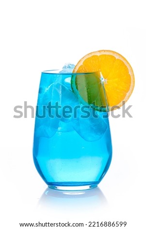 blue drink with ice cubes and orange slice on white background, isolated