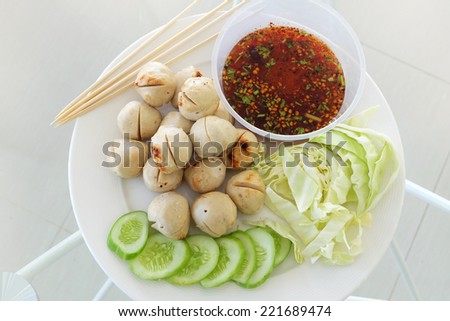 Meat ball with vegetables and sauce