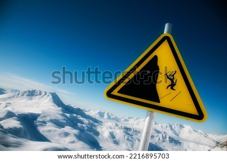 warning sign of fall danger in mountain