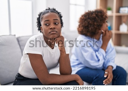 African american women mother and daughter arguing at home Royalty-Free Stock Photo #2216898195