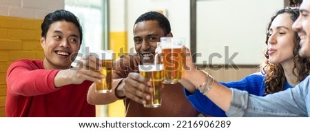 Horizontal banner or header with multiethnic friends drinking beer at brewery bar restaurant on weekend - Friendship concept with young people having fun together - Focus on middle Eastern man