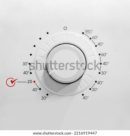 washing machine control panel. display washing machine with displaying 20 grad celsius. save energy concept due to cold washing Royalty-Free Stock Photo #2216919447
