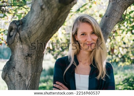 young woman taking care of doing gardening and agriculture work