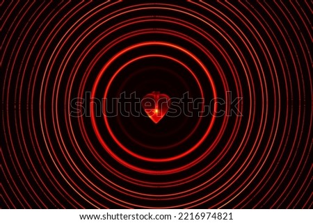 Manipulated abstract photograph of a glowing red heart light