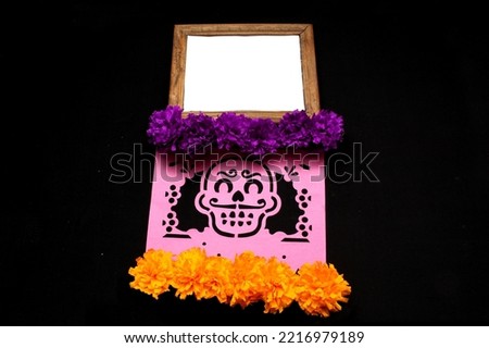Decorative objects for the altar of the Day of the Dead make a frame for phrases, banners, invitations and posts with cempasuchil portraits and traditional papel picado from Mexican culture.