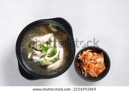 Dak Gomtang is instant pot korean chicken pot or korean chicken soup served in ttukbaegi with kimchi.