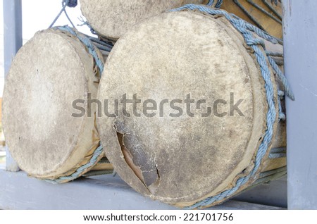 An old drum used to be beaten in a Thai temple.