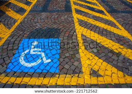 Parking for cars and signal for the disabled
