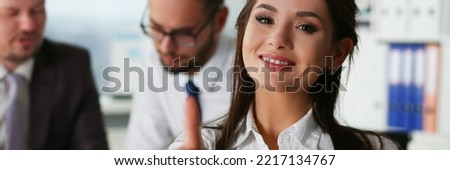 Woman hand showing ok sign or confirm idea during conference in office