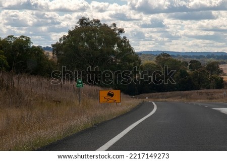 Rural Australia, autumn countryside scene with road safety signs