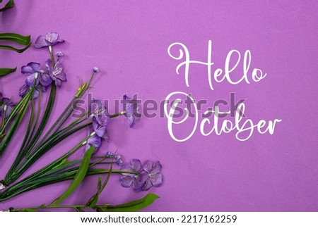 Hello October greeting with purple flowers 