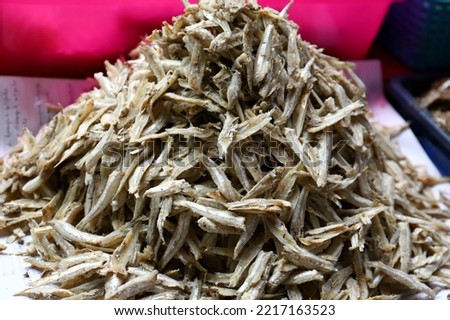 Indonesian traditional food named "ikan teri asin" i.e. heap of salted anchovies fish 