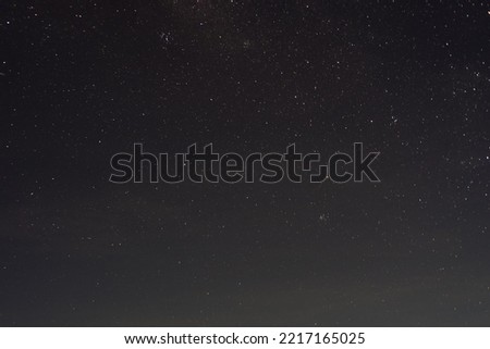 Night photography image of universe and stars with high ISO grained picture