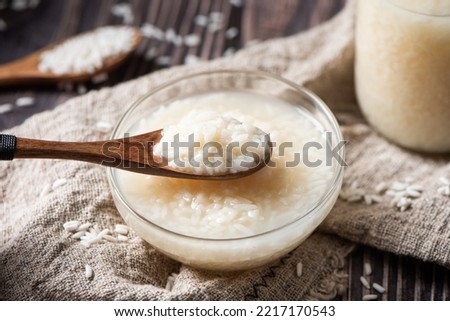 Delicious fermented glutinous rice wine on table Royalty-Free Stock Photo #2217170543