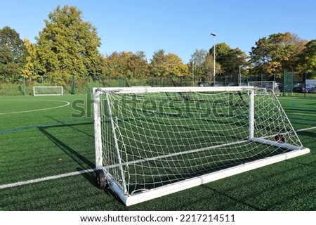 Floodlit all-weather artificial 5-a-side football pitch Royalty-Free Stock Photo #2217214511