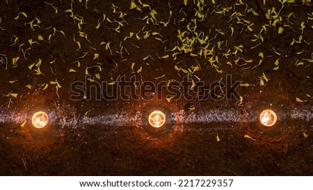 Diya lamps lit during diwali celebration Royalty-Free Stock Photo #2217229357