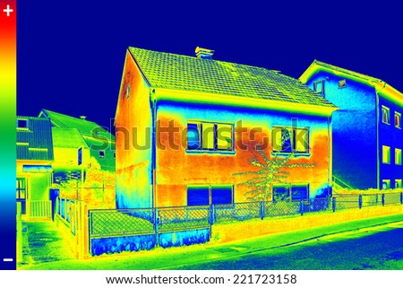 Infrared thermovision image showing lack of thermal insulation on House Royalty-Free Stock Photo #221723158